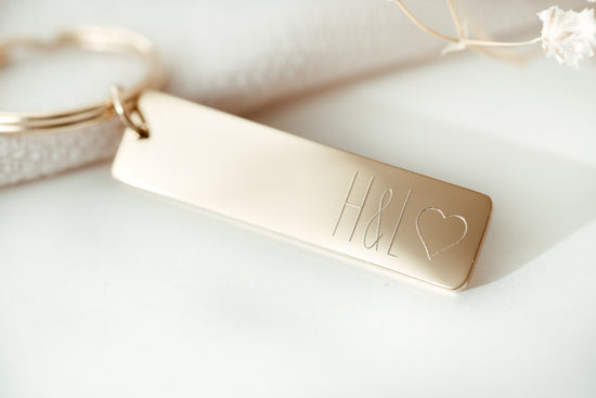 Schlüsselanhänger mit Initialen graviert